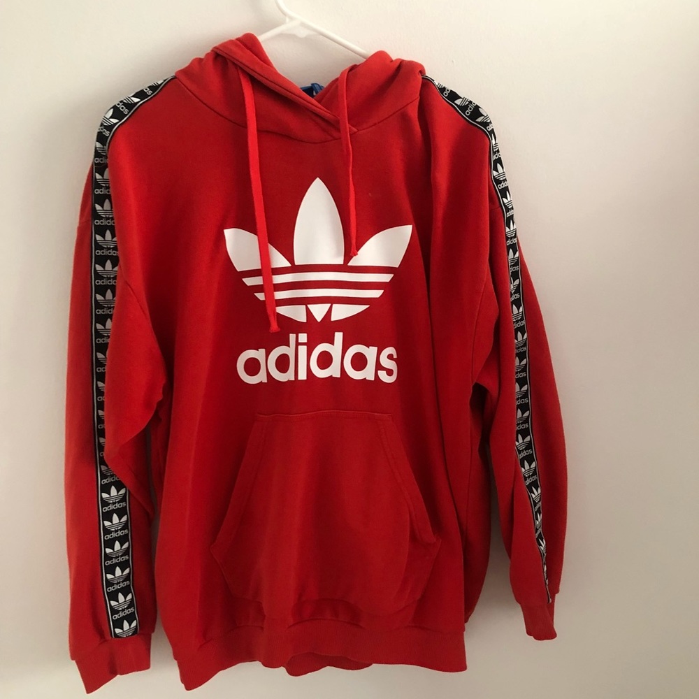 Red women’s Adidas sweatshirt